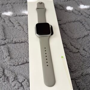 Apple watch s5 working perfectly w band and charger. Tiny dent on left top frame